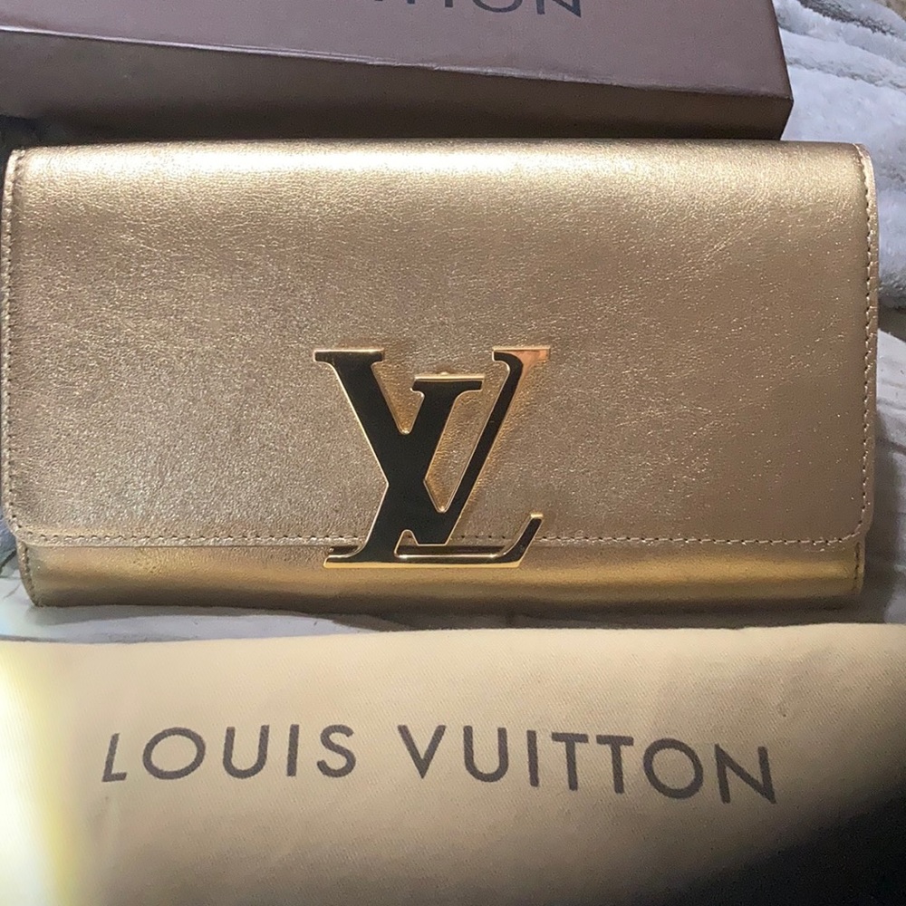 Louis Vuitton EW CUIR DORE clutch AUTHENTIC